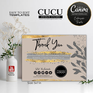 Elegant beige thank you card template featuring gold brush stroke accents, botanical leaf illustrations, editable logo section, social media icons, and customizable Canva design for small businesses.

ES: Elegante plantilla de tarjeta de agradecimiento en color beige con detalles de pinceladas doradas, ilustraciones botánicas de hojas, espacio editable para logotipo, iconos de redes sociales y diseño personalizable en Canva para pequeños negocios.